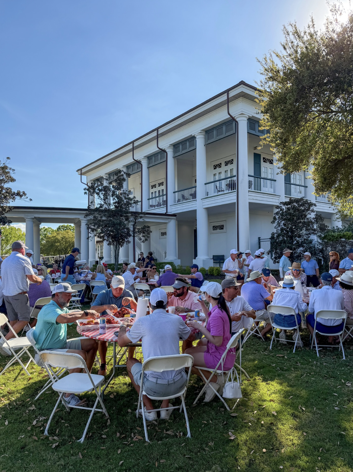 Crawfish boil on the CCL lawn with the clubhouse in the background