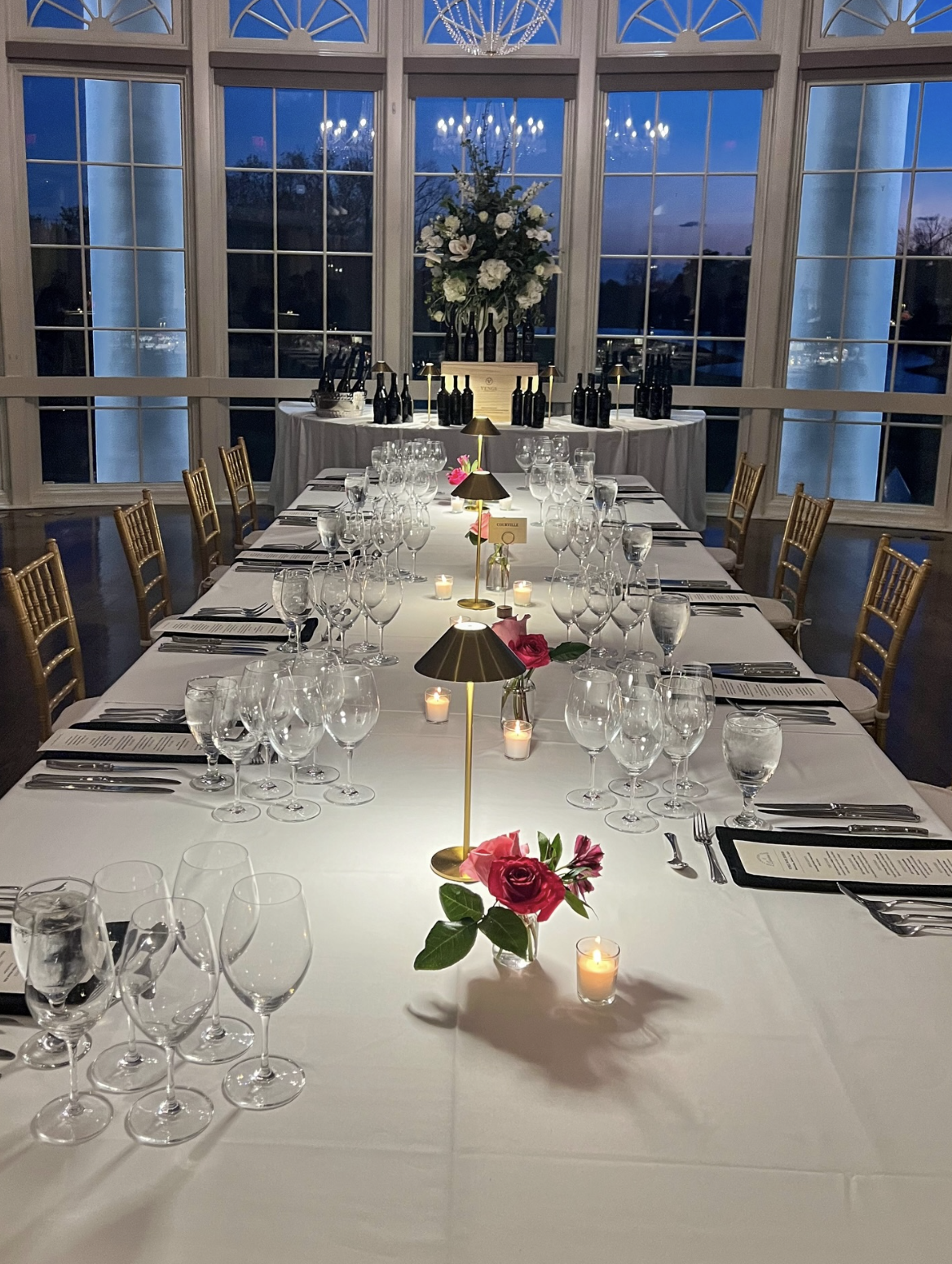 Country Club of Louisiana — candlelit dining room set for a wine dinner