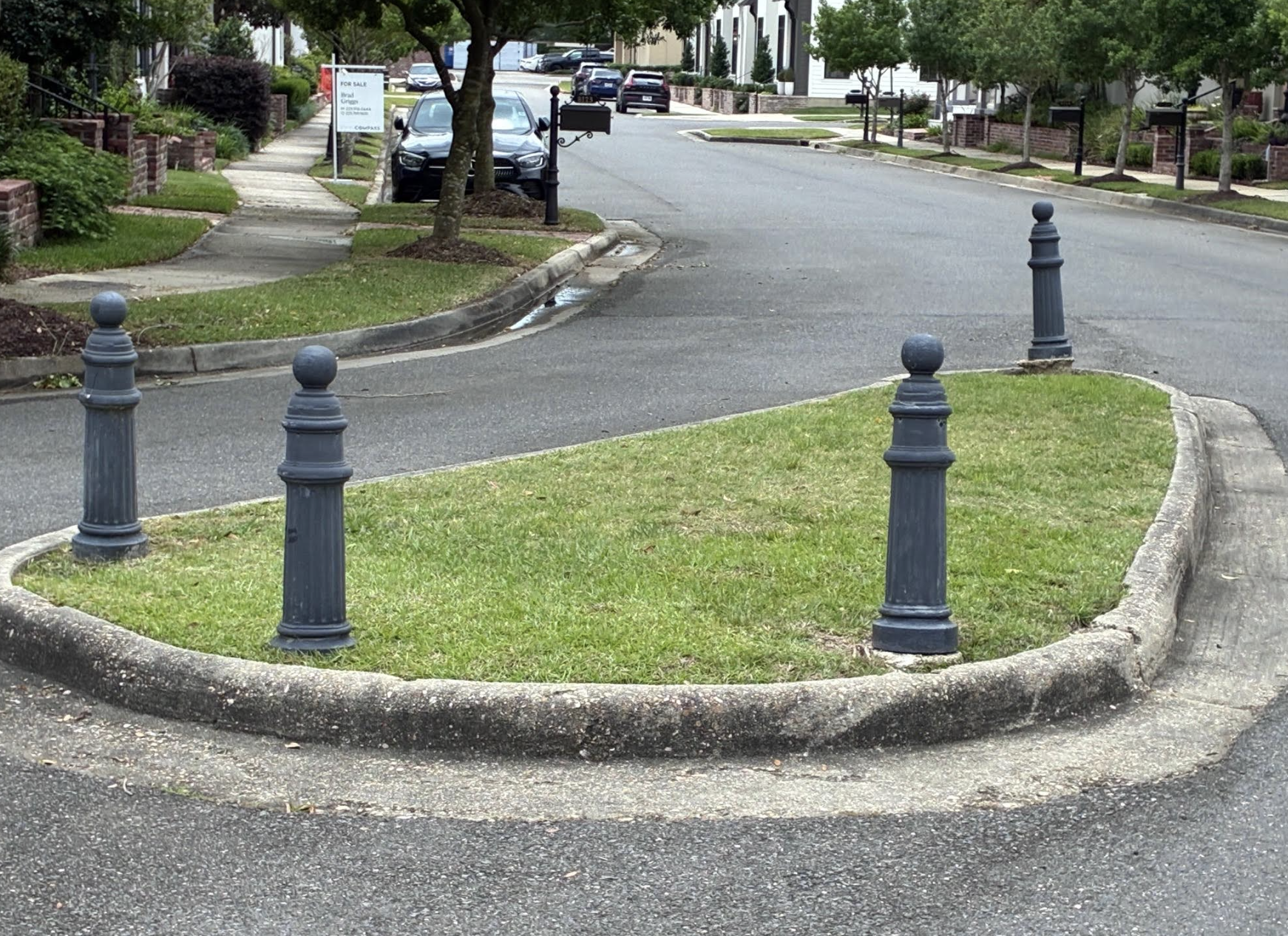 Willow Grove street bollards and green median — classic neighborhood streetscape
